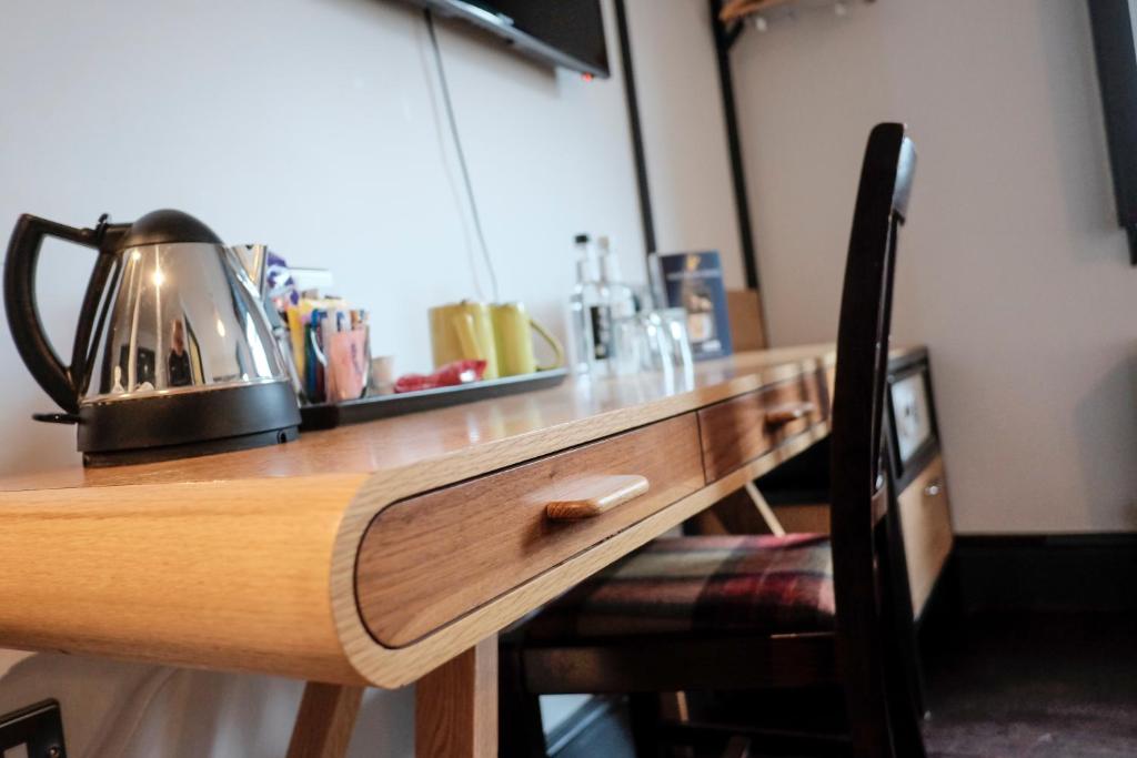 Příslušenství pro přípravu čaje a kávy v ubytování The Wellington Hotel