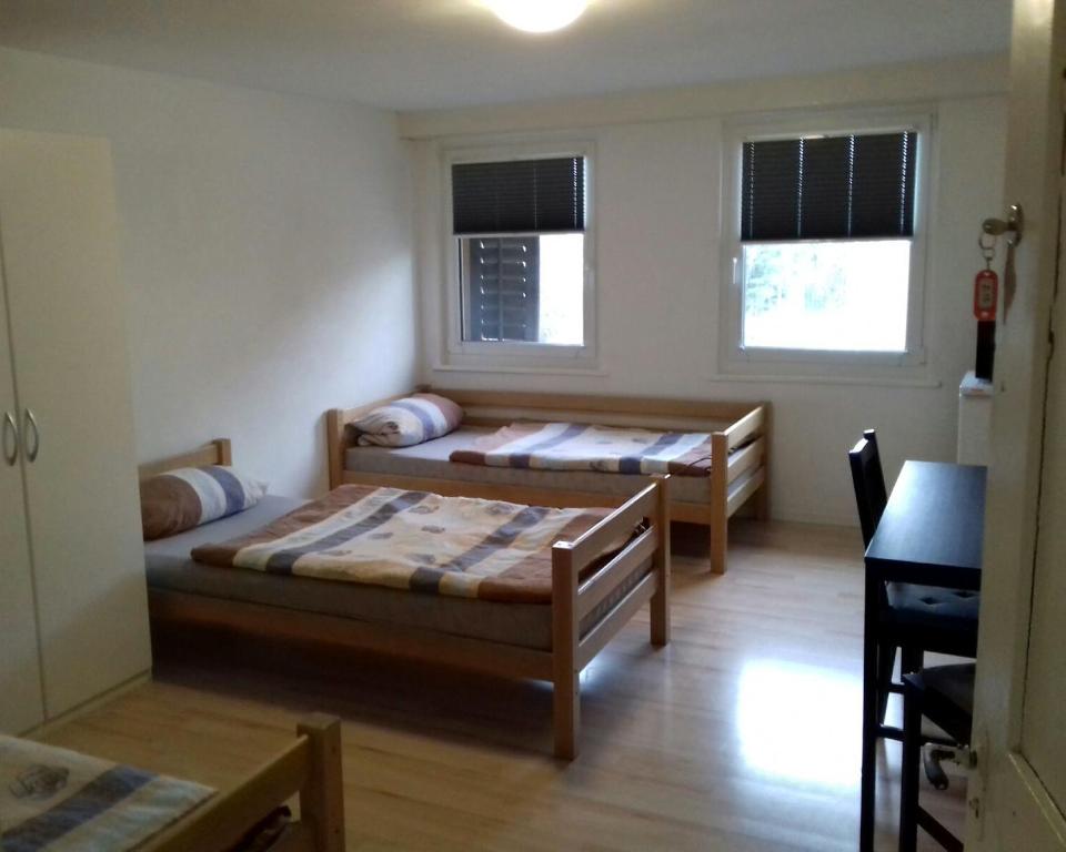 Postel nebo postele na pokoji v ubytování Hostel Airport