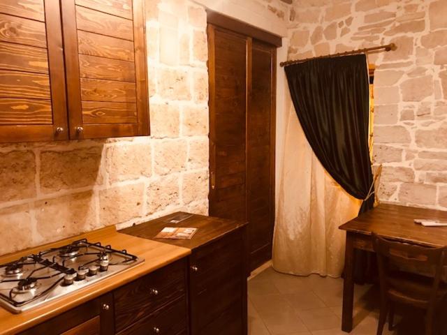 Kuchyň nebo kuchyňský kout v ubytování Albergo Tripoli B&B Affittacamere