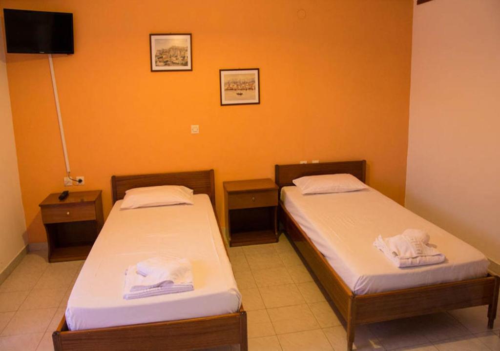 Postel nebo postele na pokoji v ubytování Filoxenia