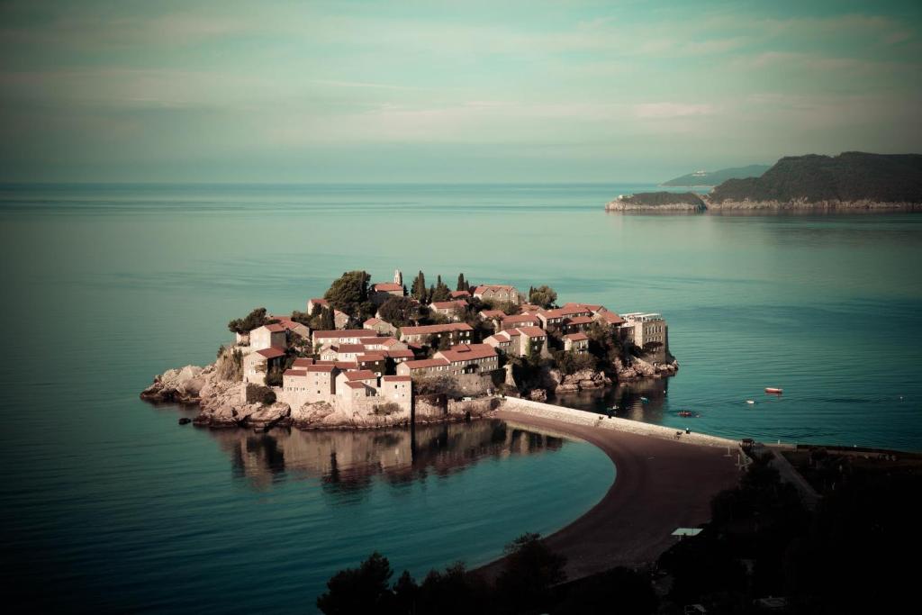 a small island in the middle of the water at Villa Edelweiss in Sveti Stefan