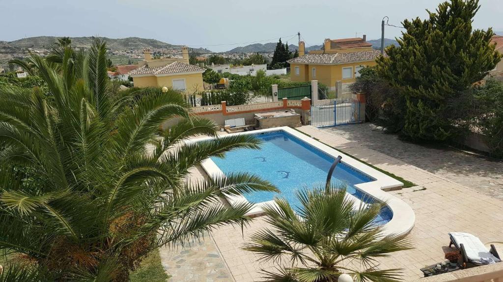 The swimming pool at or close to Casa de los amigos