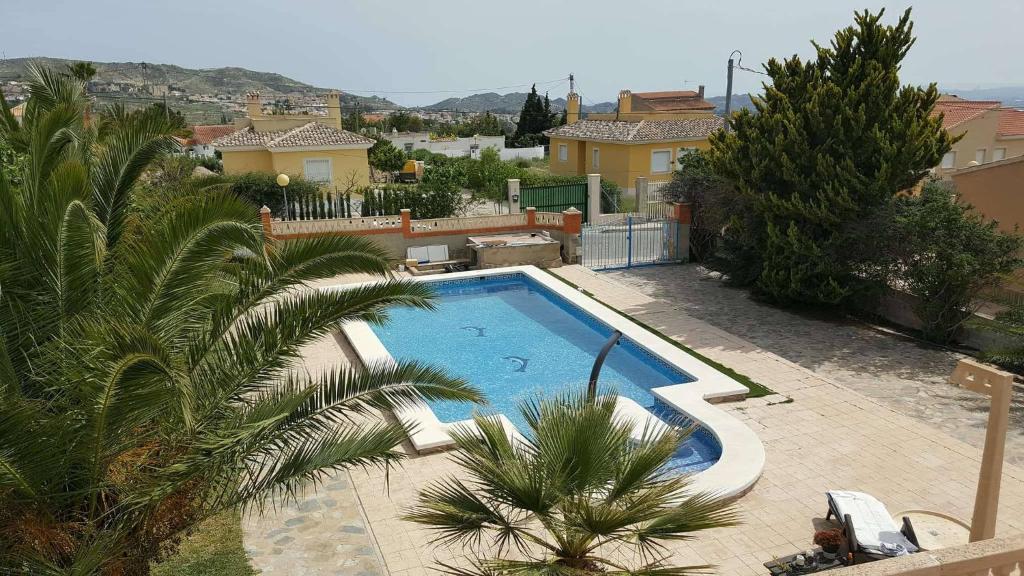 The swimming pool at or close to Casa de los amigos