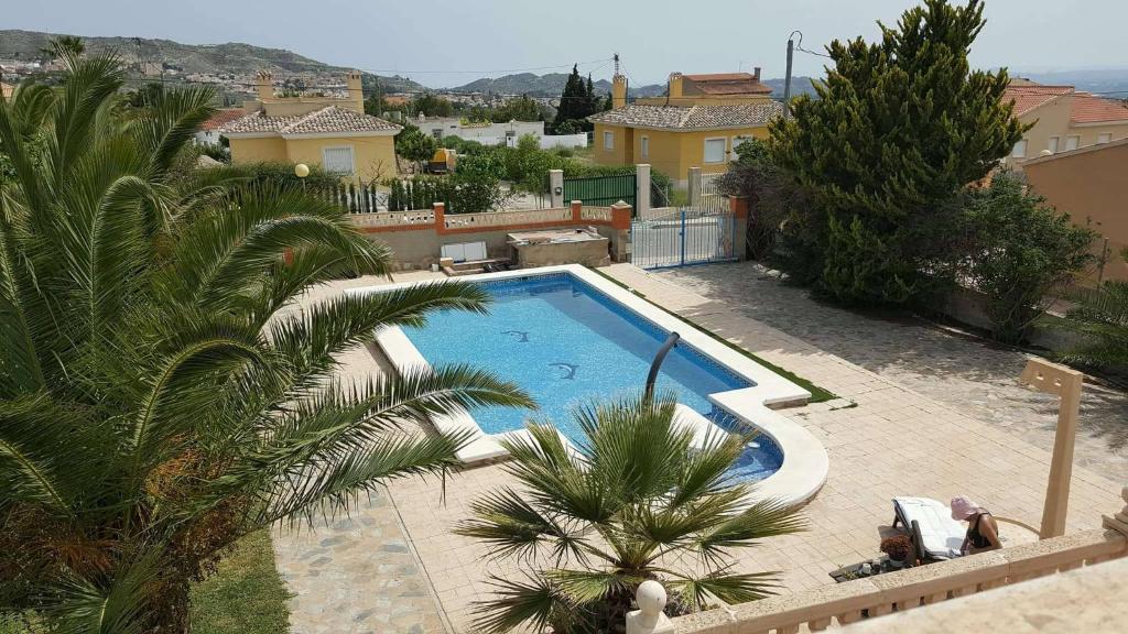 The swimming pool at or close to Casa de los amigos