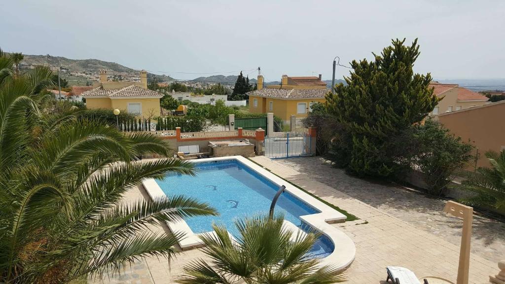 The swimming pool at or close to Casa de los amigos