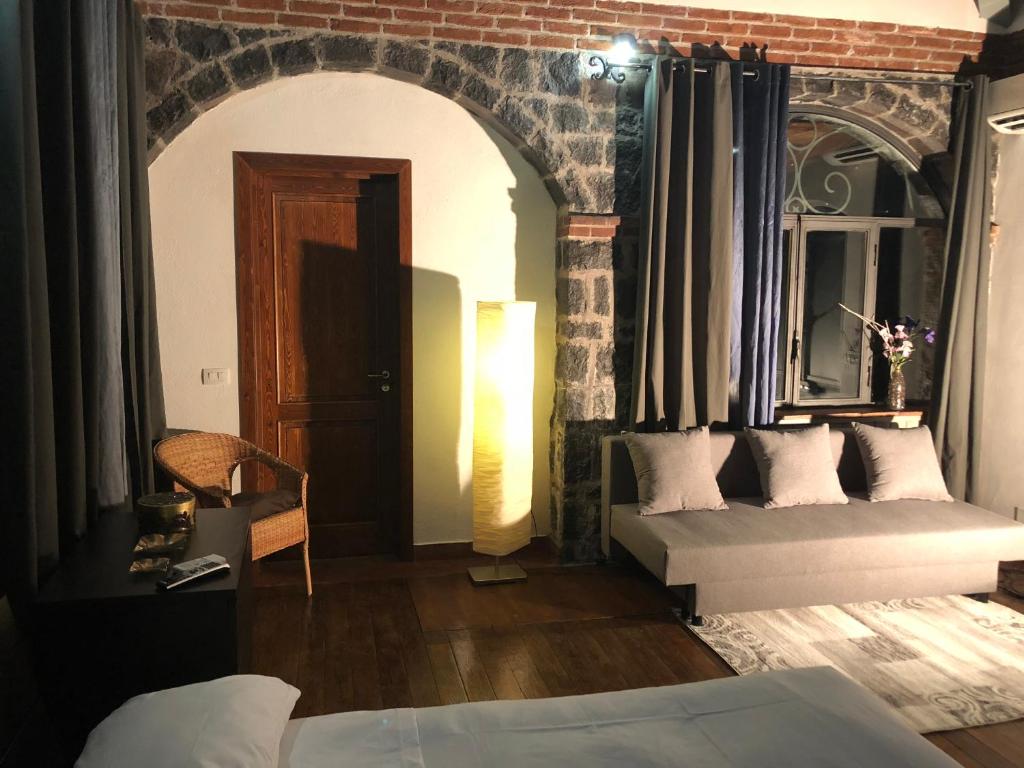 Postel nebo postele na pokoji v ubytování B&B Villa Loriana