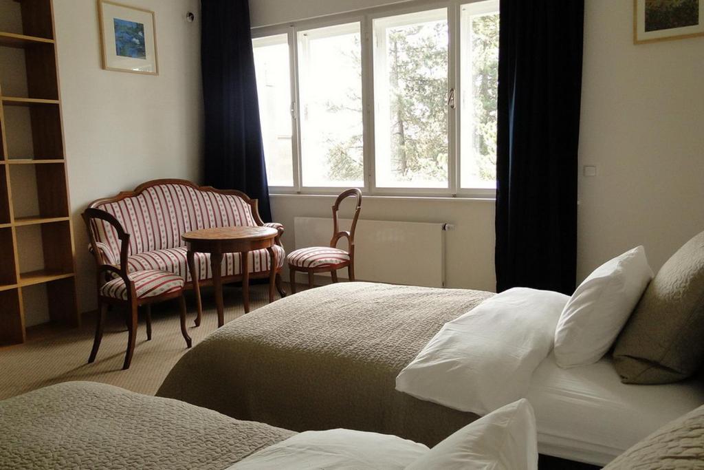 Postel nebo postele na pokoji v ubytování Apartman Brno Stred