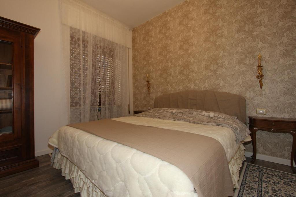 Postel nebo postele na pokoji v ubytování Romeo & Juliet Non-Hotel