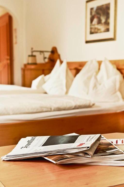 Postel nebo postele na pokoji v ubytování Hotel Lindner