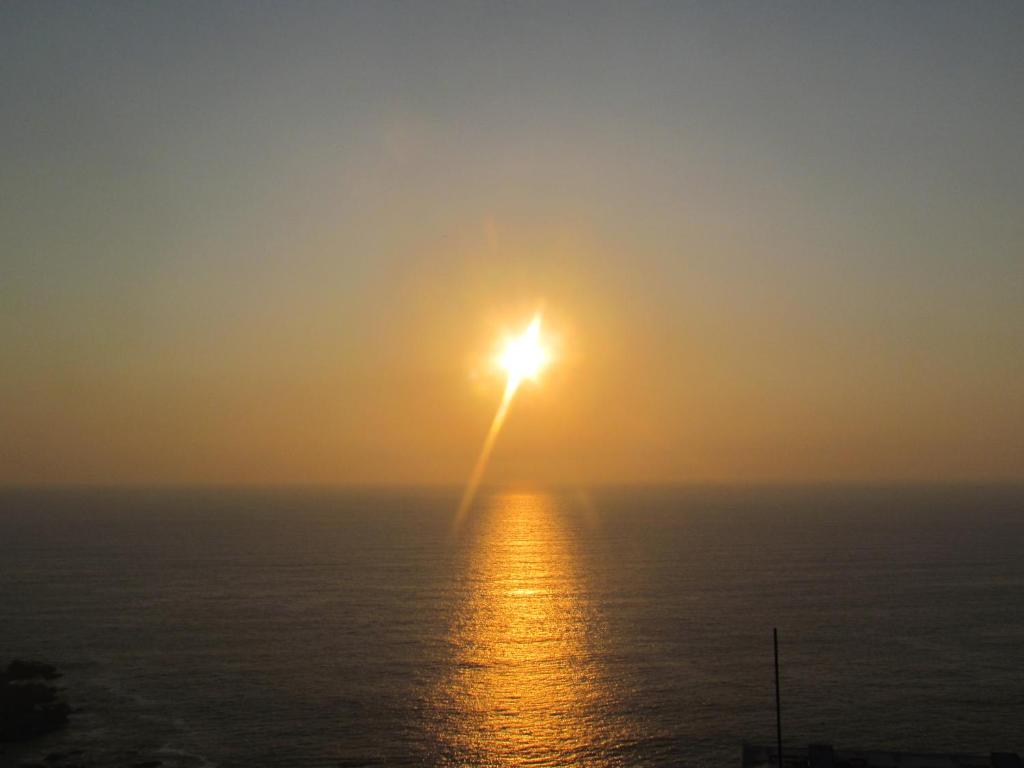 Východ nebo západ slunce při pohledu z apartmánu nebo okolí