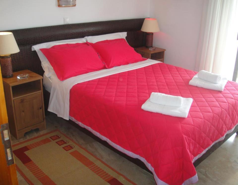 Postel nebo postele na pokoji v ubytování Antonios Rooms