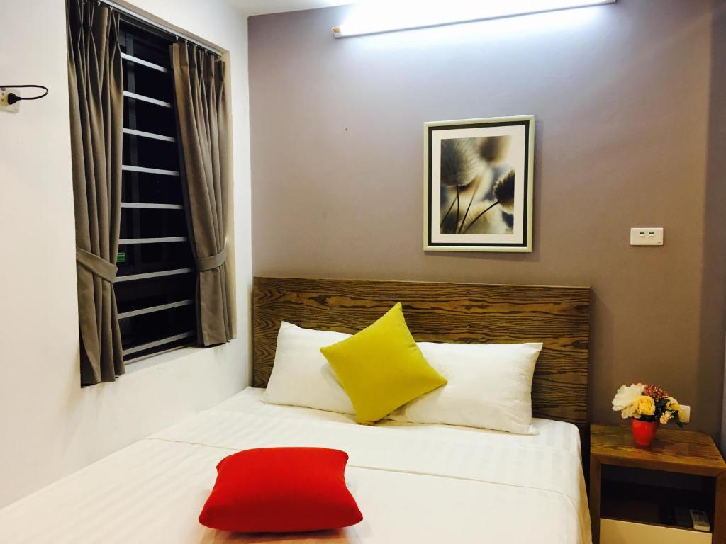 Postel nebo postele na pokoji v ubytování V House 5 Serviced Apartment