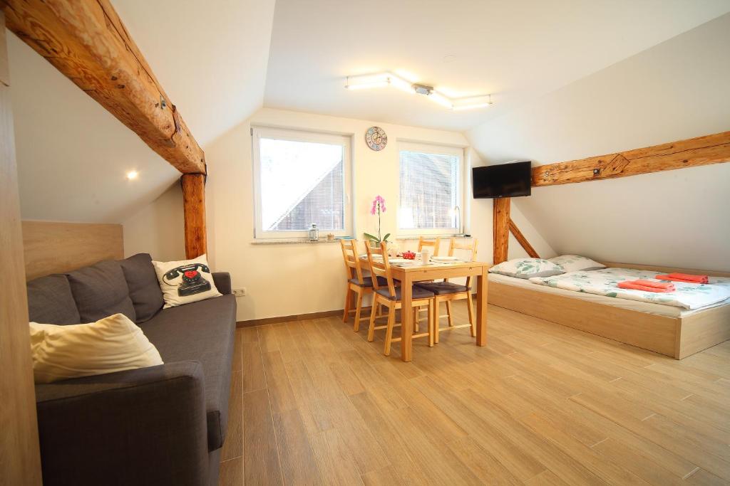 Postel nebo postele na pokoji v ubytování Apartments Planica