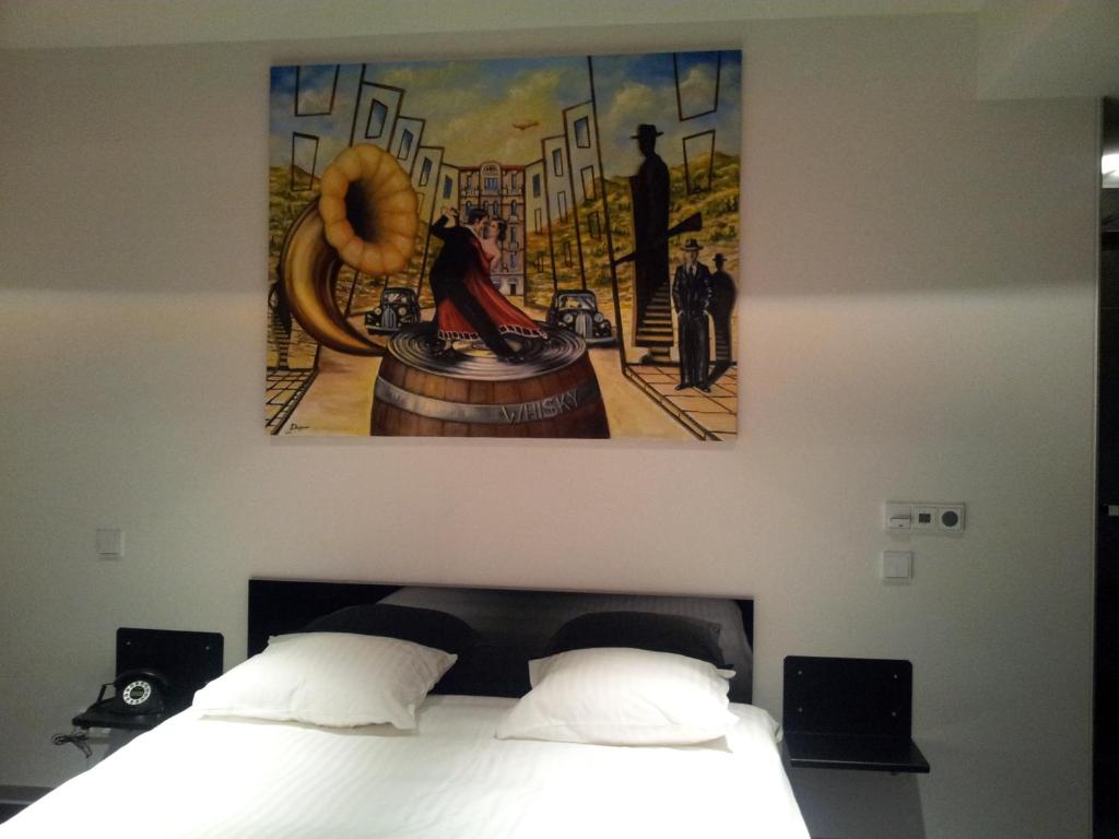 Postel nebo postele na pokoji v ubytování Hotel Grey