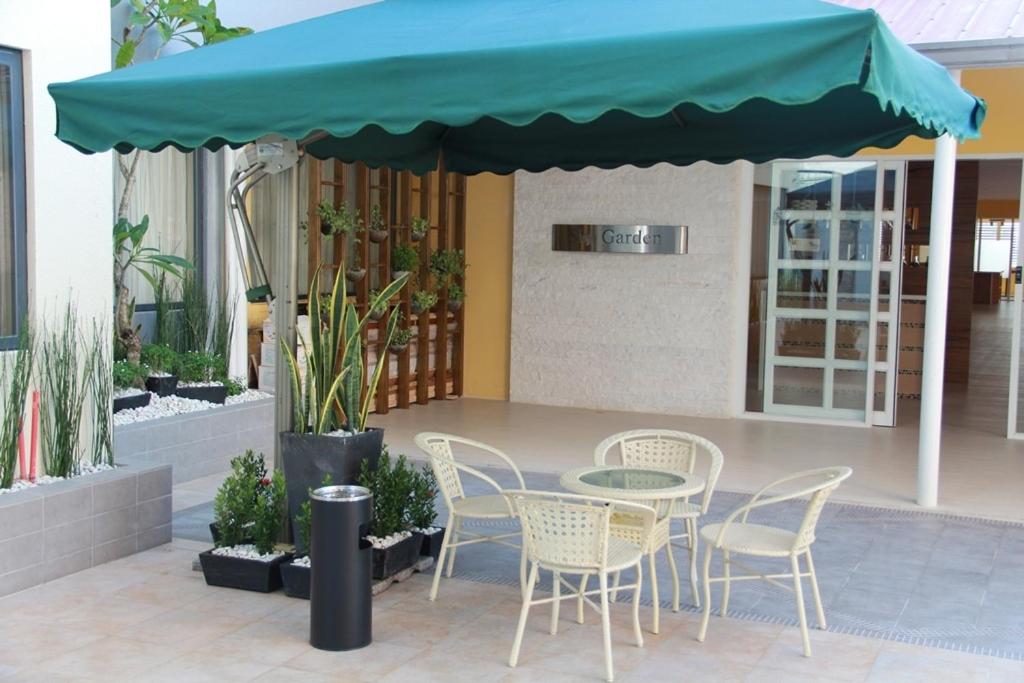Patio nebo venkovní prostory v ubytování ACE Hotel and Suites