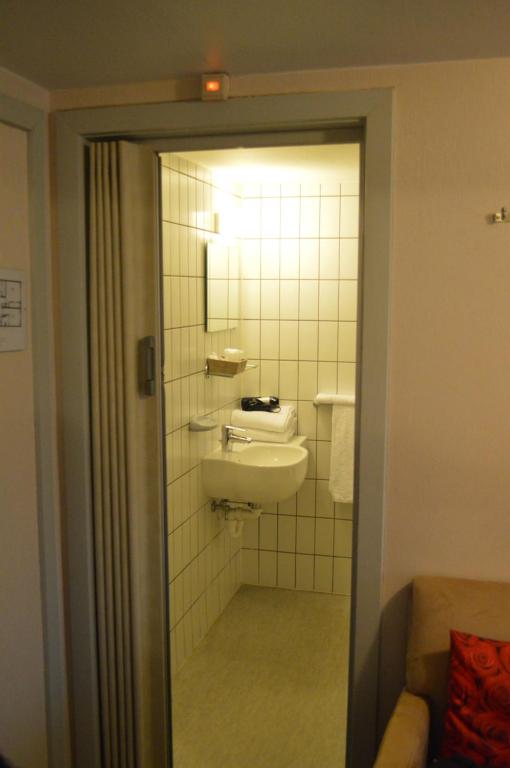 Koupelna v ubytování Hotel Honfleur