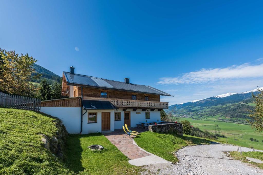 a house on the side of a hill at Almliesl PIES-533 in Piesendorf