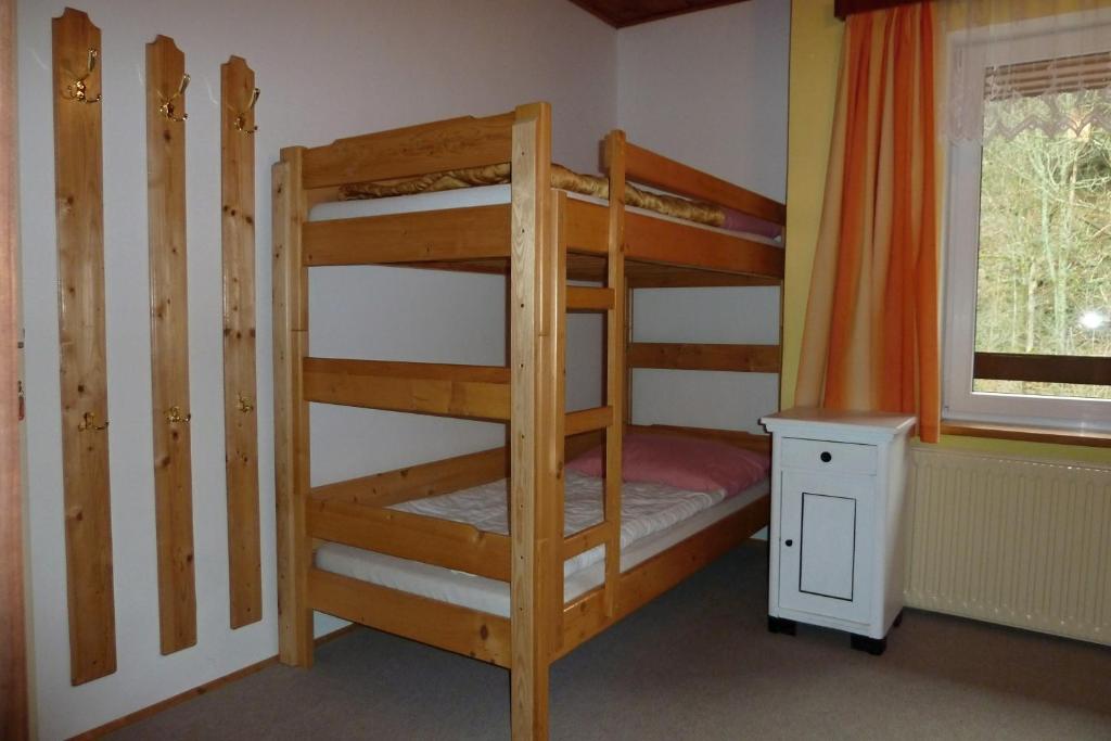 Postel nebo postele na pokoji v ubytování Pod Sněžníkem