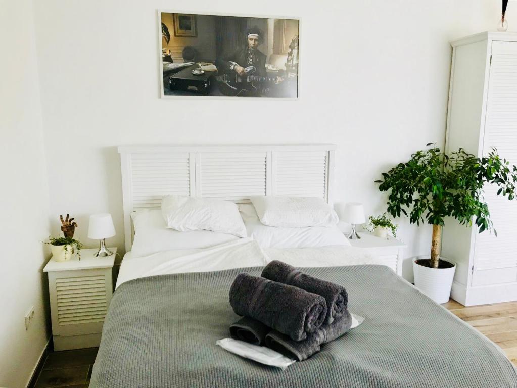 Posteľ alebo postele v izbe v ubytovaní Vista Suites 1-2