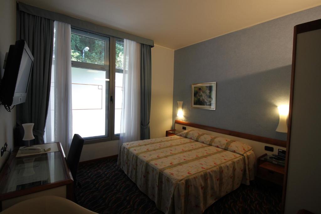 Krevet ili kreveti u jedinici u objektu Hotel San Terenzo