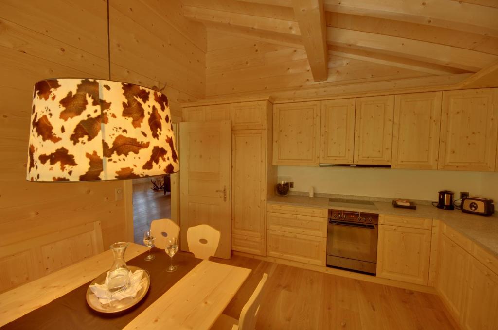 Kuchyň nebo kuchyňský kout v ubytování Schatzalp Hotel