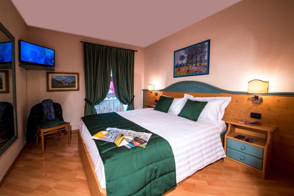 Hotel Alpina - Habitación Cuádruple Confort