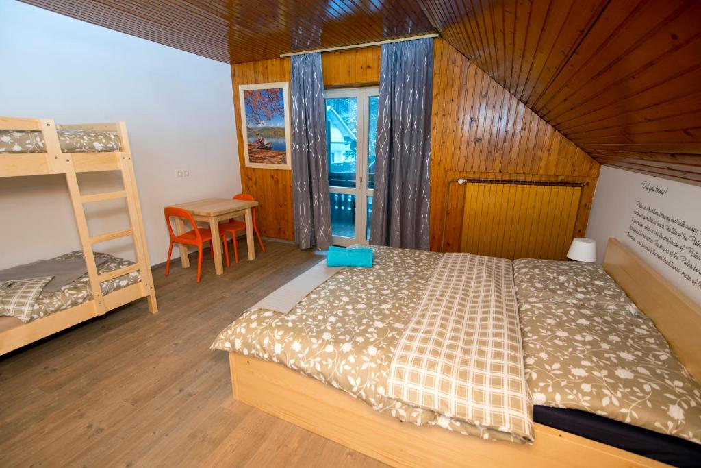 Postel nebo postele na pokoji v ubytování Vila Lipa