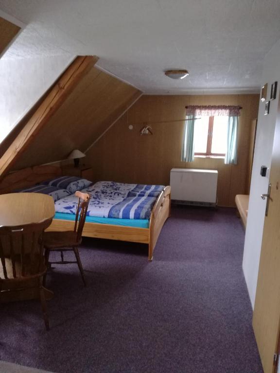 Postel nebo postele na pokoji v ubytování Penzion Kobr