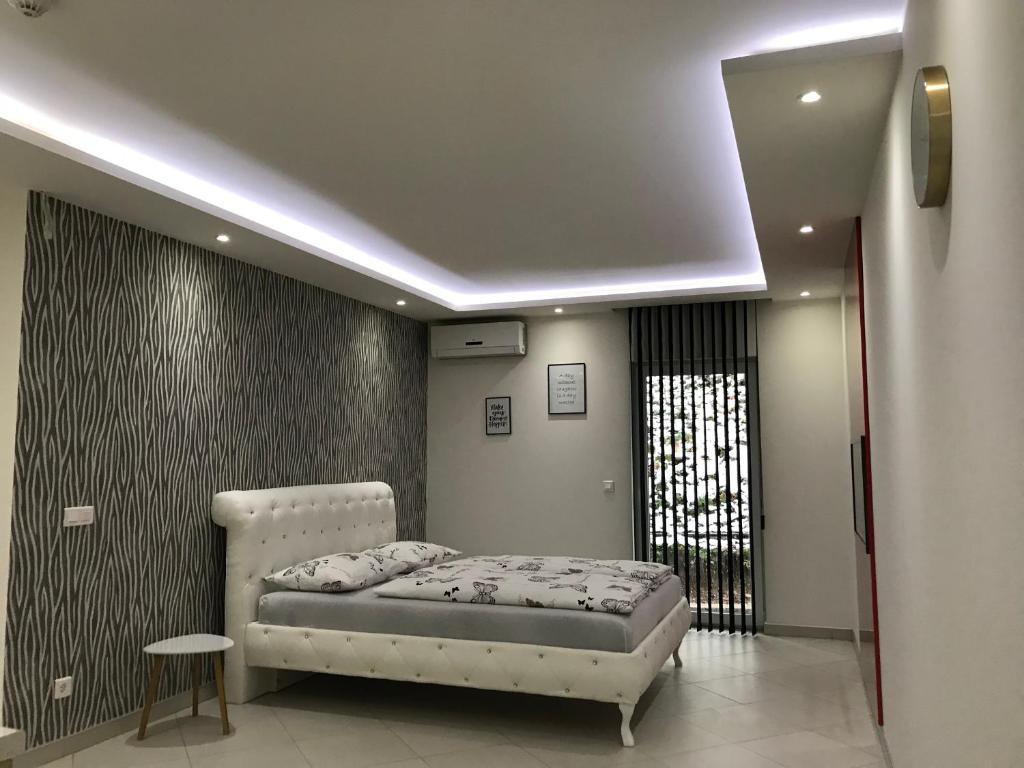 Postel nebo postele na pokoji v ubytování Apartment Ajla