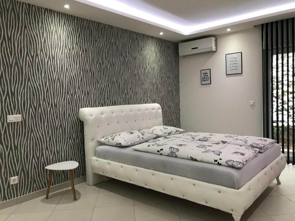 Postel nebo postele na pokoji v ubytování Apartment Ajla