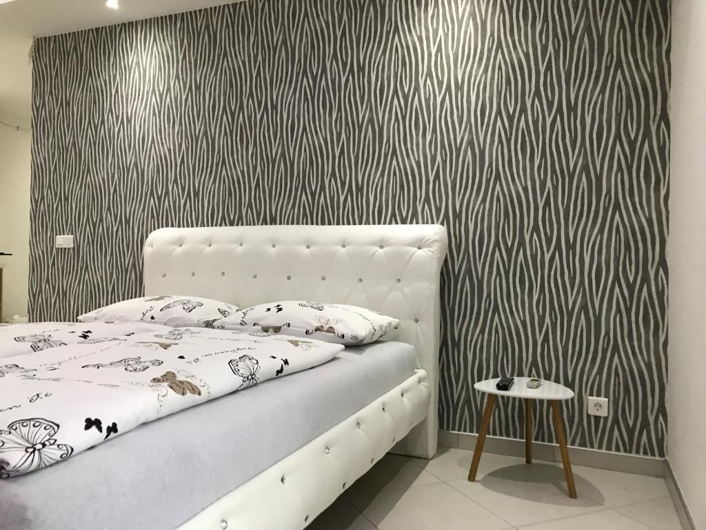 Postel nebo postele na pokoji v ubytování Apartment Ajla