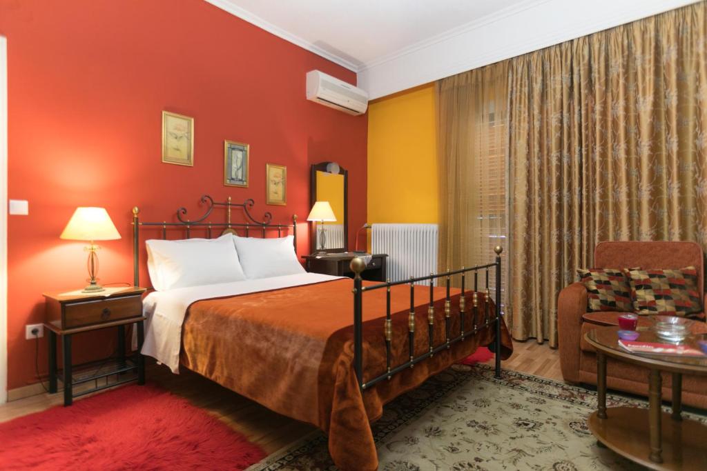 A bed or beds in a room at Xenonas Epavli