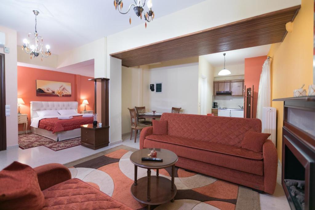A bed or beds in a room at Xenonas Epavli