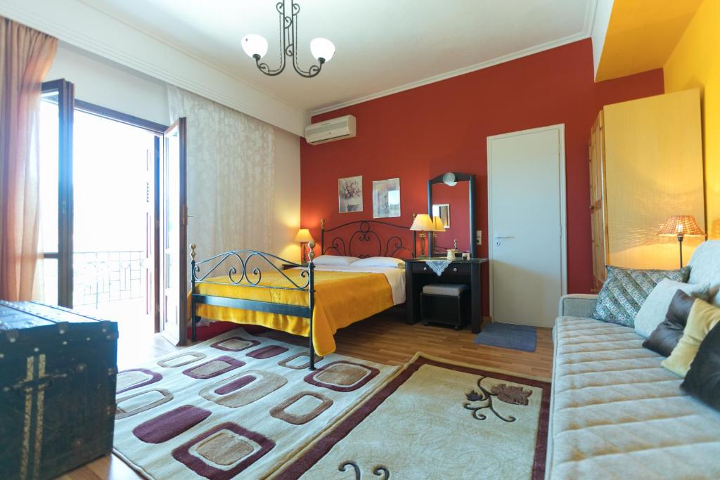 A bed or beds in a room at Xenonas Epavli