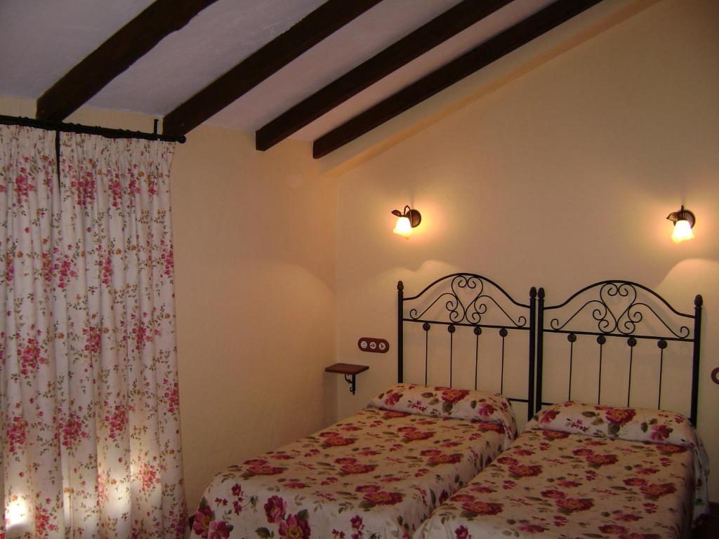 Postel nebo postele na pokoji v ubytování Apartamentos Trinidad