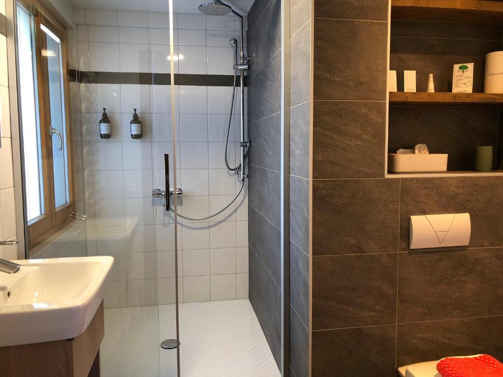 Koupelna v ubytování Hotel Les Etagnes