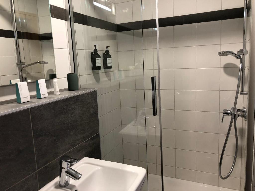Koupelna v ubytování Hotel Les Etagnes