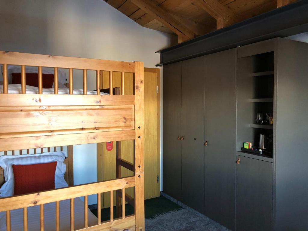 Postel nebo postele na pokoji v ubytování Hotel Les Etagnes