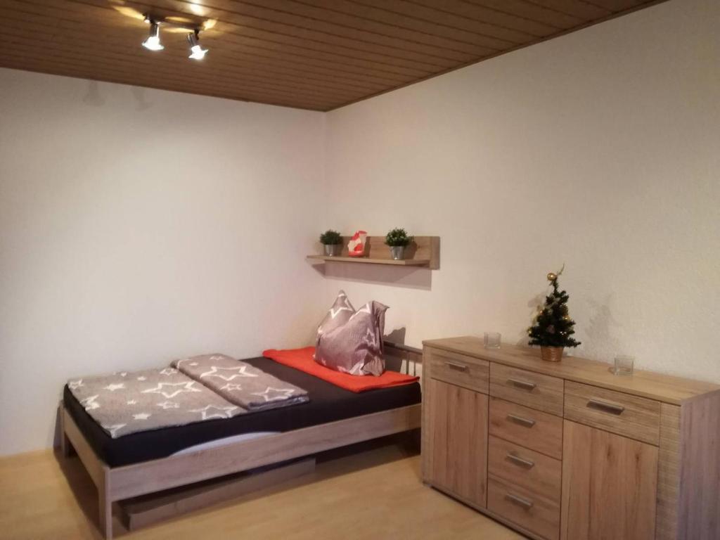 Postel nebo postele na pokoji v ubytování apartmány 2+1 u Klínovce