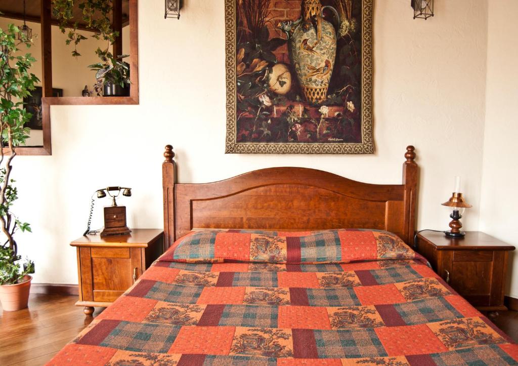 Postel nebo postele na pokoji v ubytování Sonya Apartments