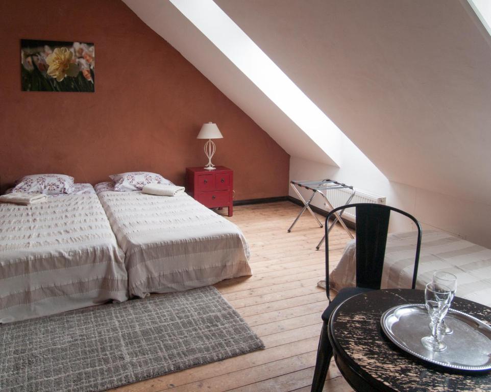 Postel nebo postele na pokoji v ubytování Mokko Country Hotel