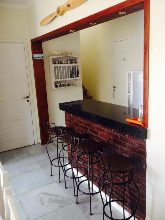  Casa 3 dormitórios sendo uma suíte com ar