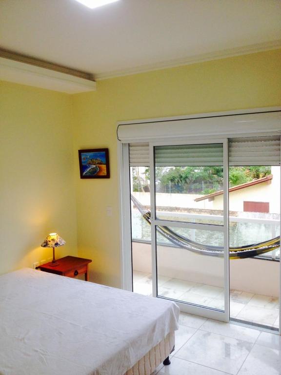  Casa 3 dormitórios sendo uma suíte com ar