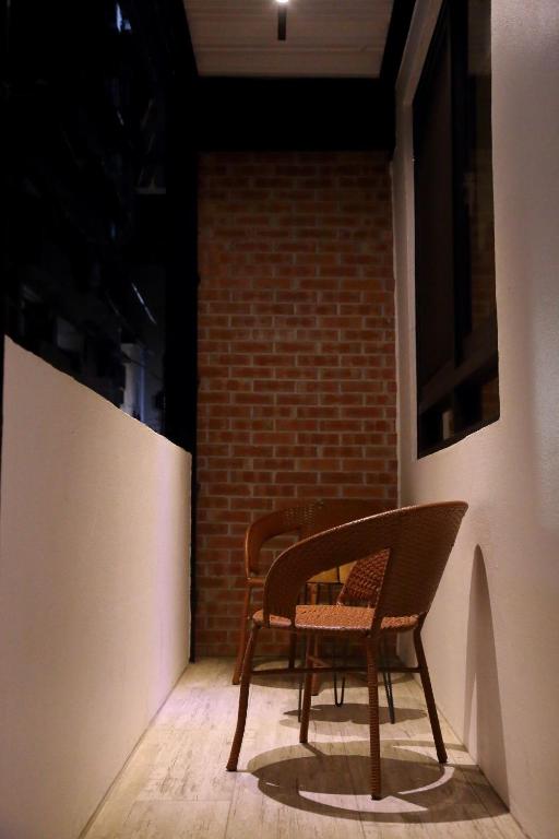 Posezení v ubytování Donghai Cottage Backpack Inn Suite