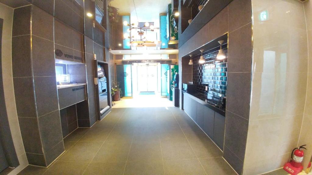 TV a/nebo společenská místnost v ubytování Vovo Hotel