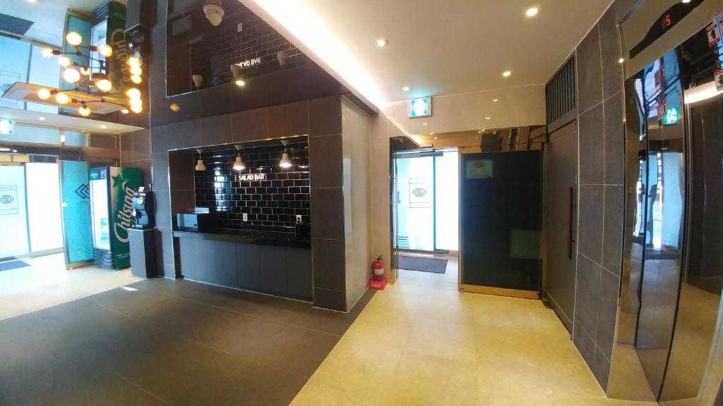 Kuchyň nebo kuchyňský kout v ubytování Vovo Hotel