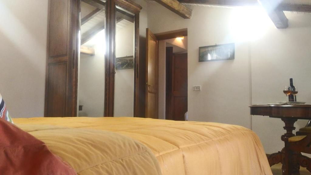 Postel nebo postele na pokoji v ubytování Baduerughe - ValledelLago