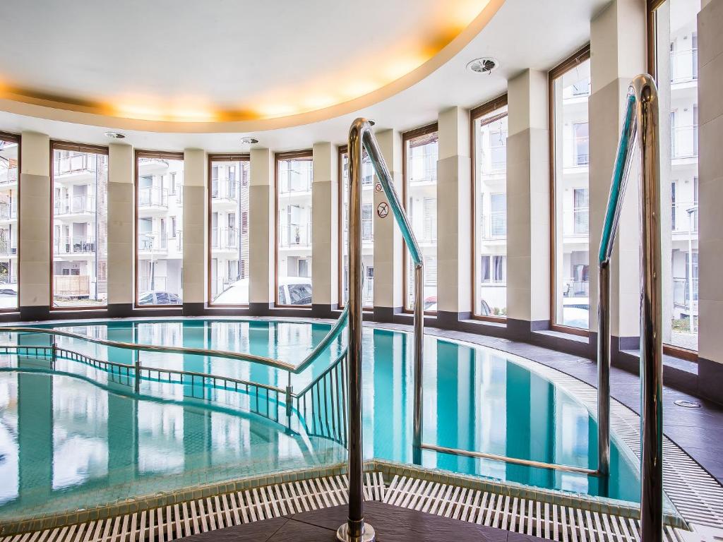 Bazén v ubytovaní TatryTop Stara Polana Spa alebo v jeho blízkosti