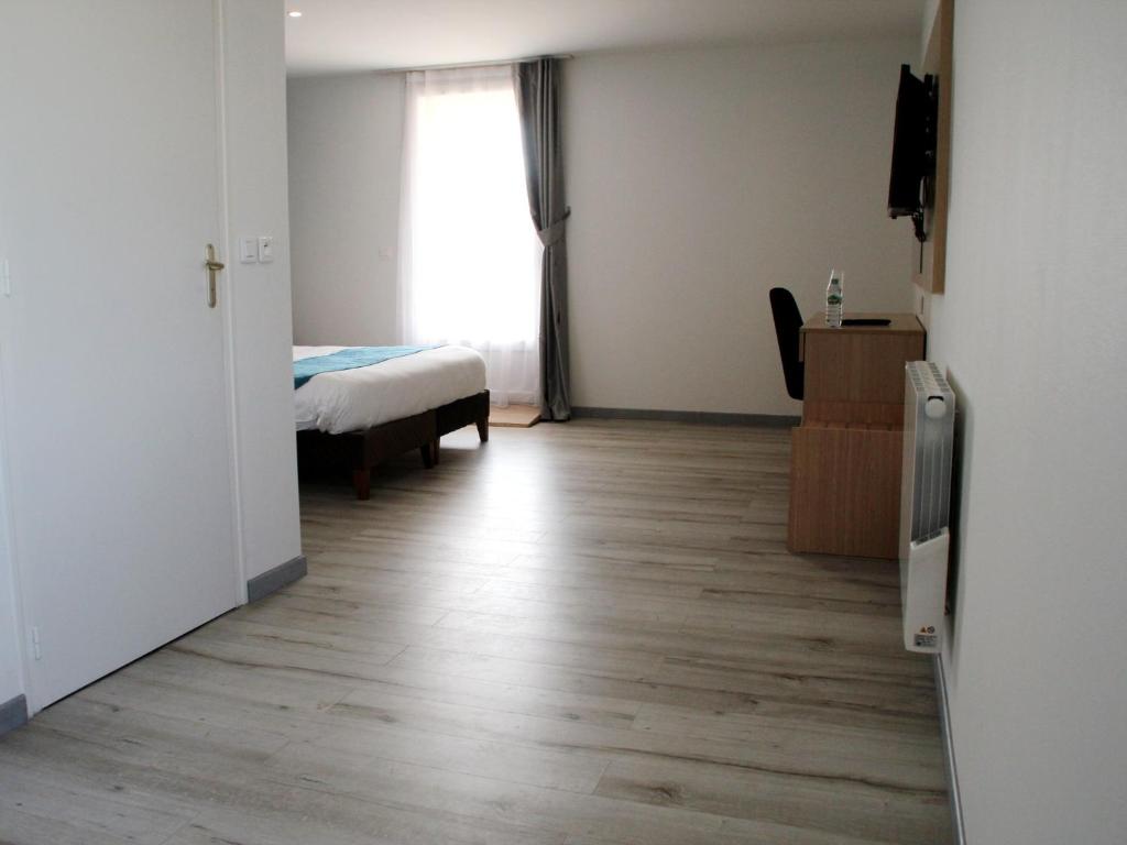 Voodi või voodid majutusasutuse Saglam Hôtel toas