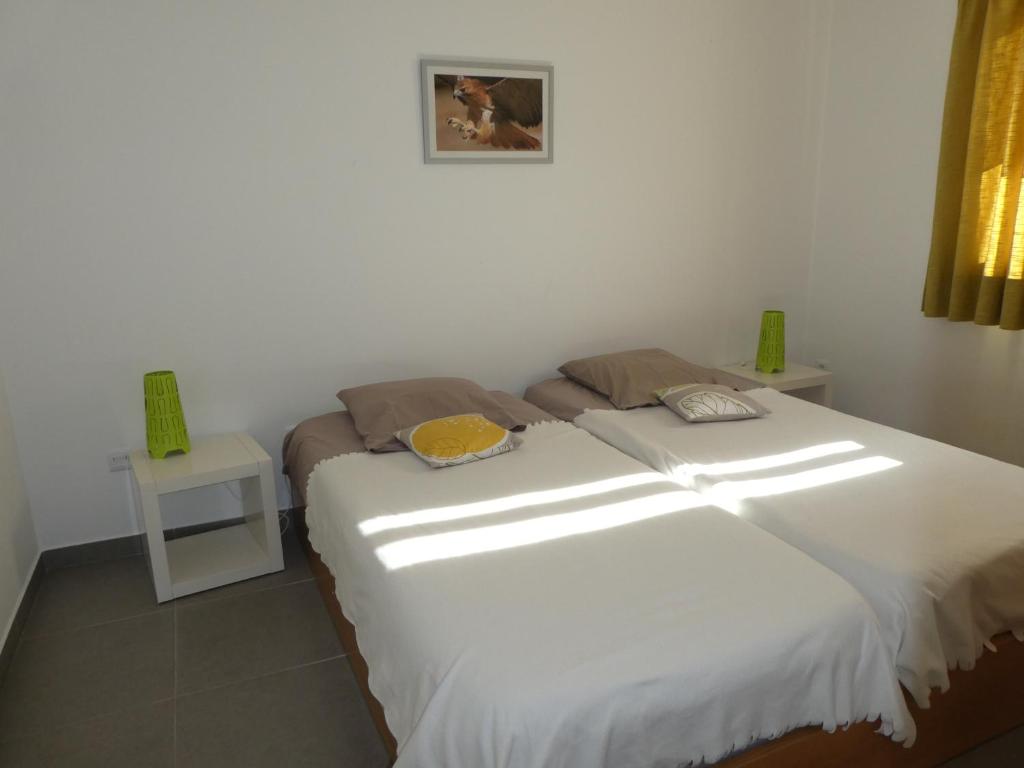 Uma cama ou camas num quarto em Quinta das Cegonhas